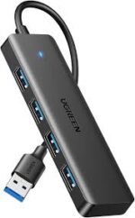 Ugreen CM219 4-Port USB 3.0 Hub (UG-25851) expands your device with four high-speed USB ports, offering fast 5Gbps data transfer, stable performance, and wide compatibility. Perfect for laptops, PCs, and accessories. Plug-and-play convenience.